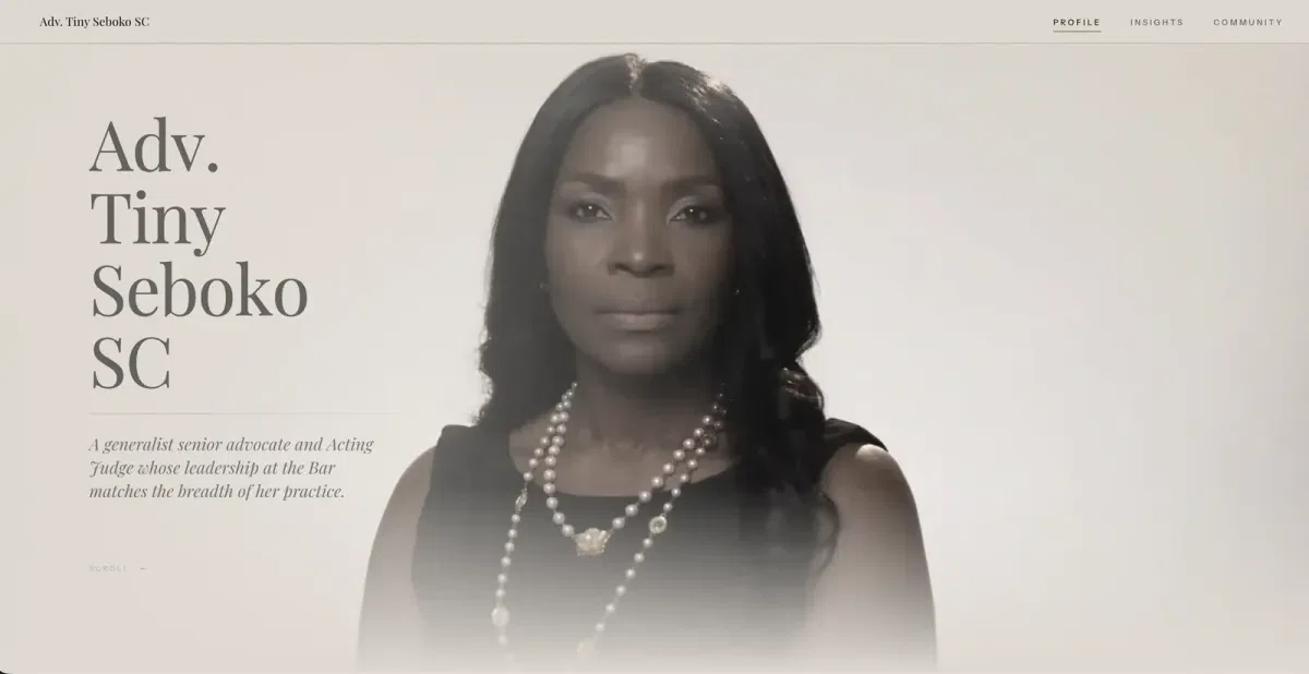 A Tier 3 portfolio: a full-bleed portrait with the advocate's name set large in a serif over a pale ground